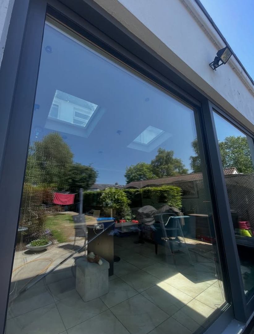 Picture window reflecting the garden