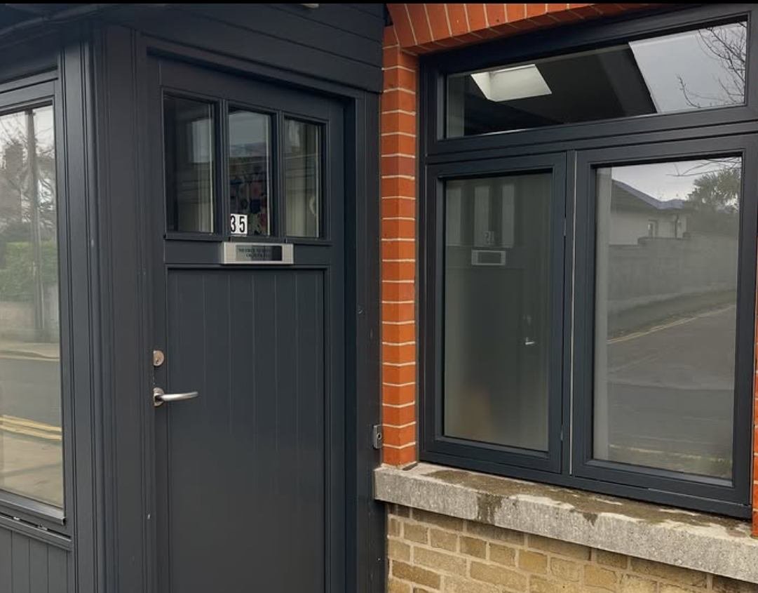 Dark-framed door and windows cleaned