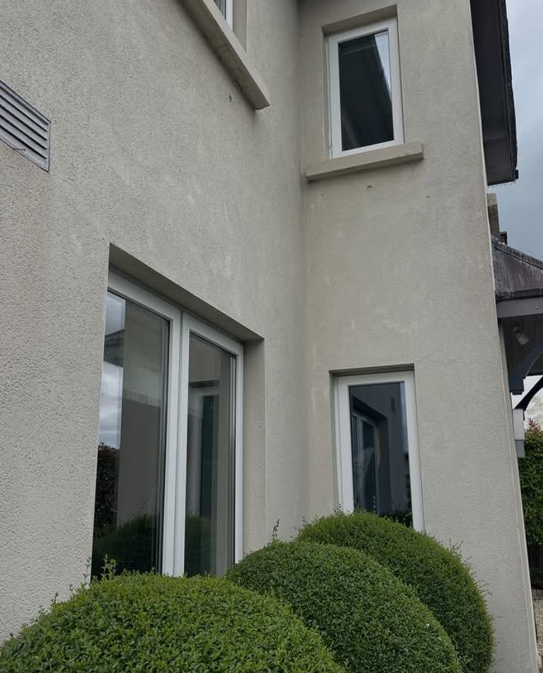 Rendered home with clean upper windows